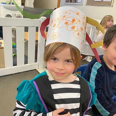 Girl at nursery dressing up